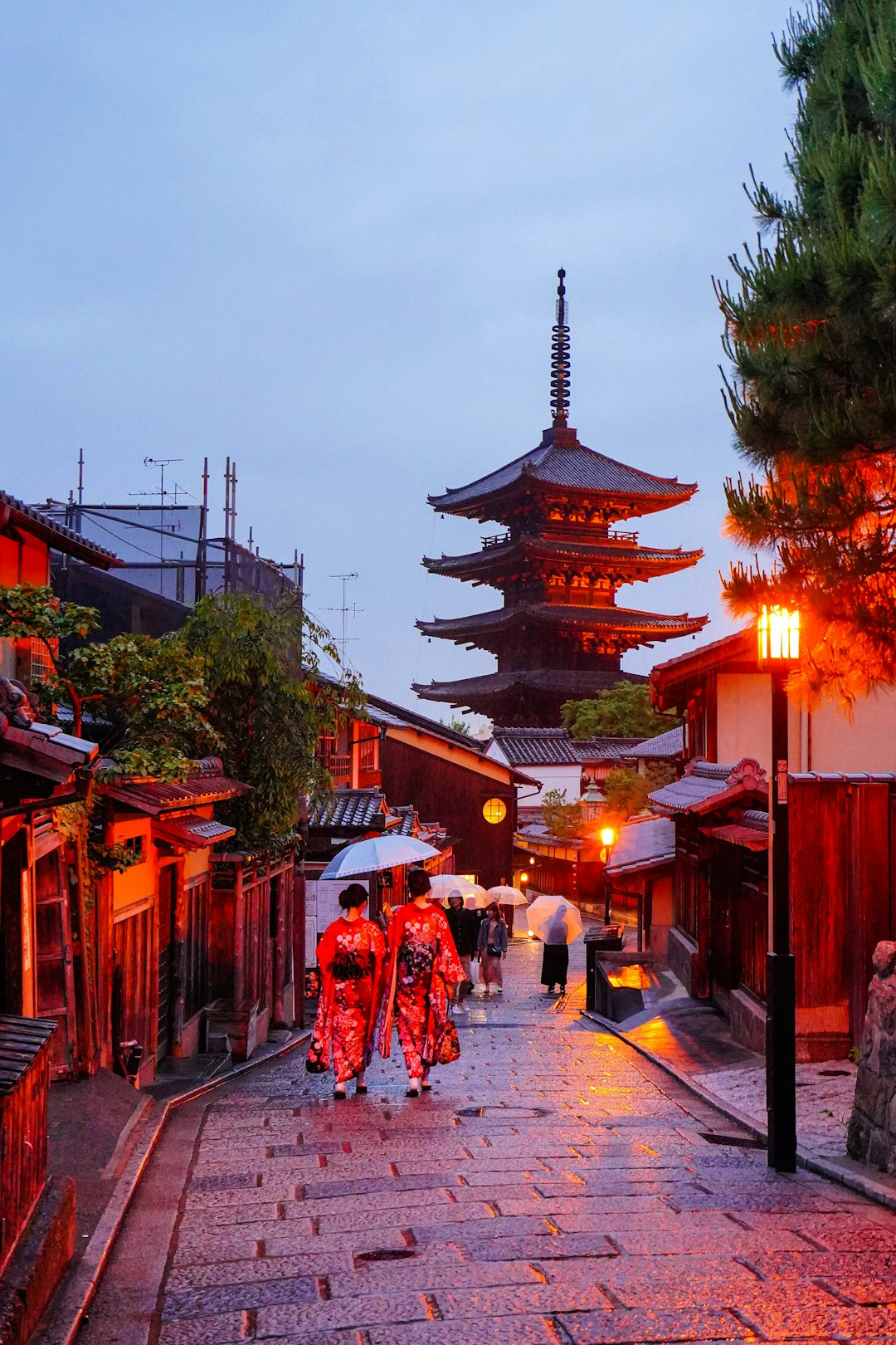 Geisha walking through traditional Gion district in Kyoto