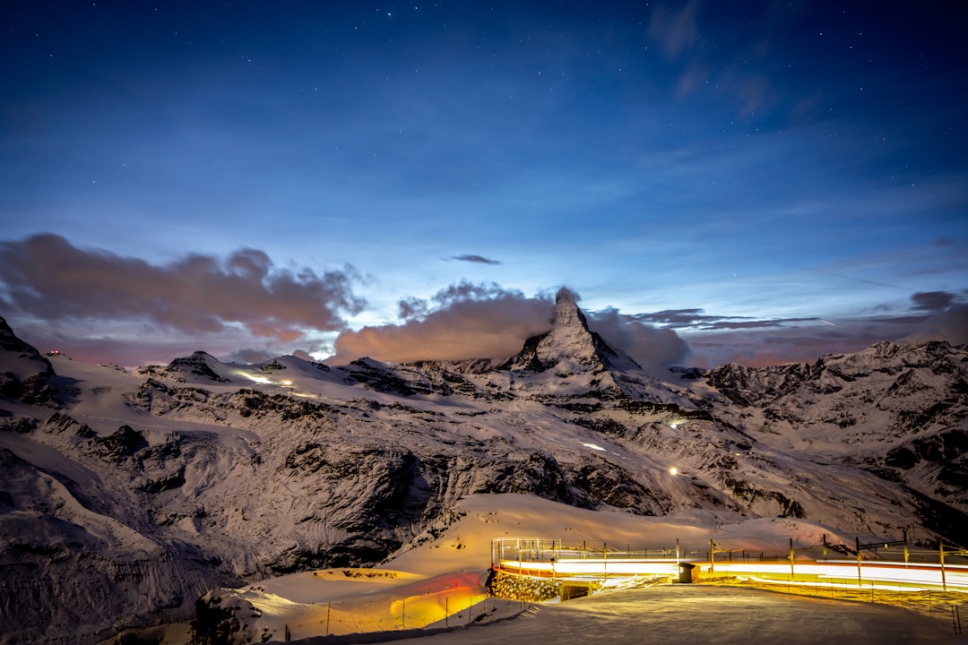 Majestic Swiss Alps mountain peaks and alpine village